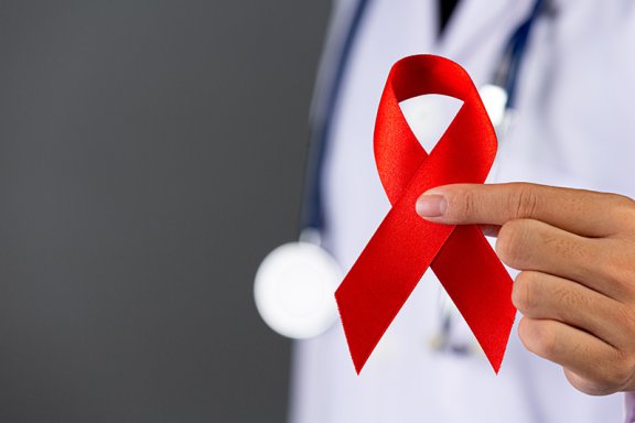The doctor holds a red ribbon, HIV awareness awareness, World AI